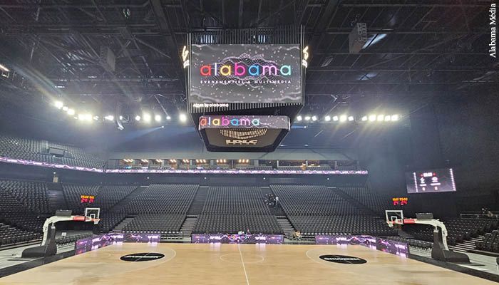 LED cube suspended over a basketball court