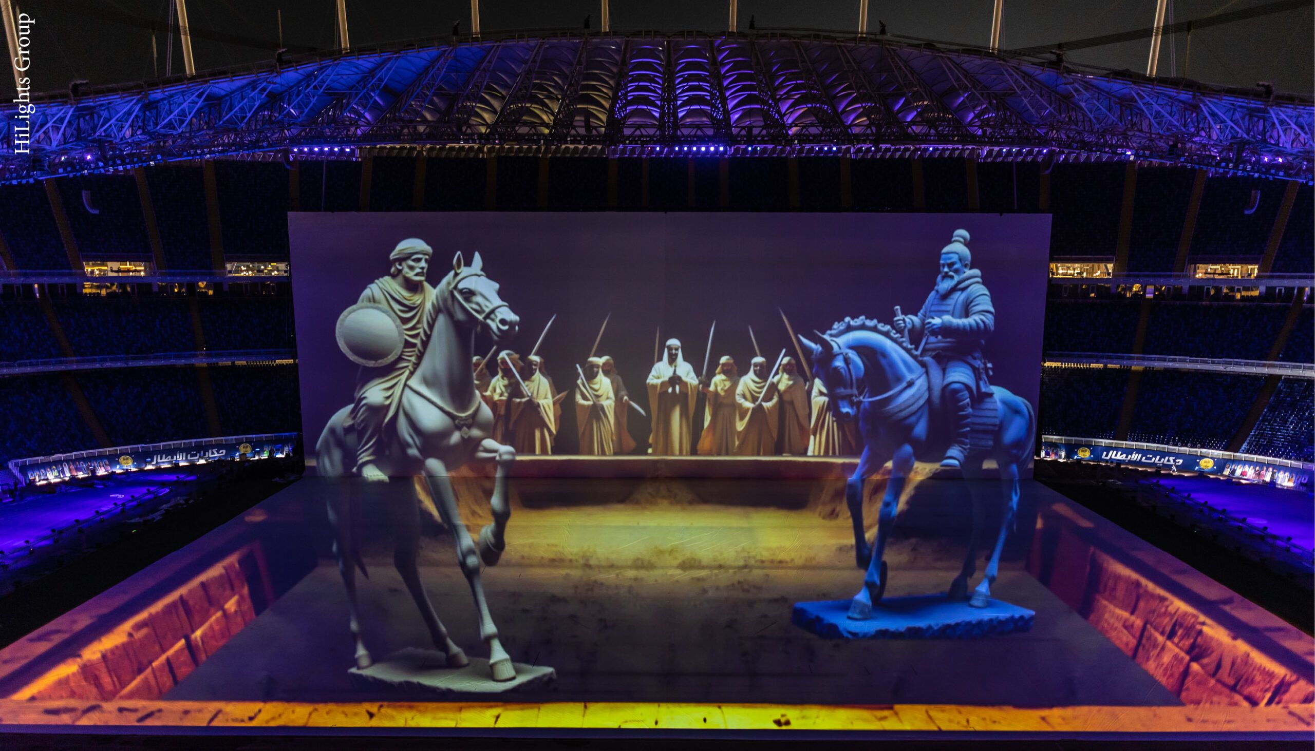 3D projection mapping show at stadium, featuring imagery of two figures on horseback