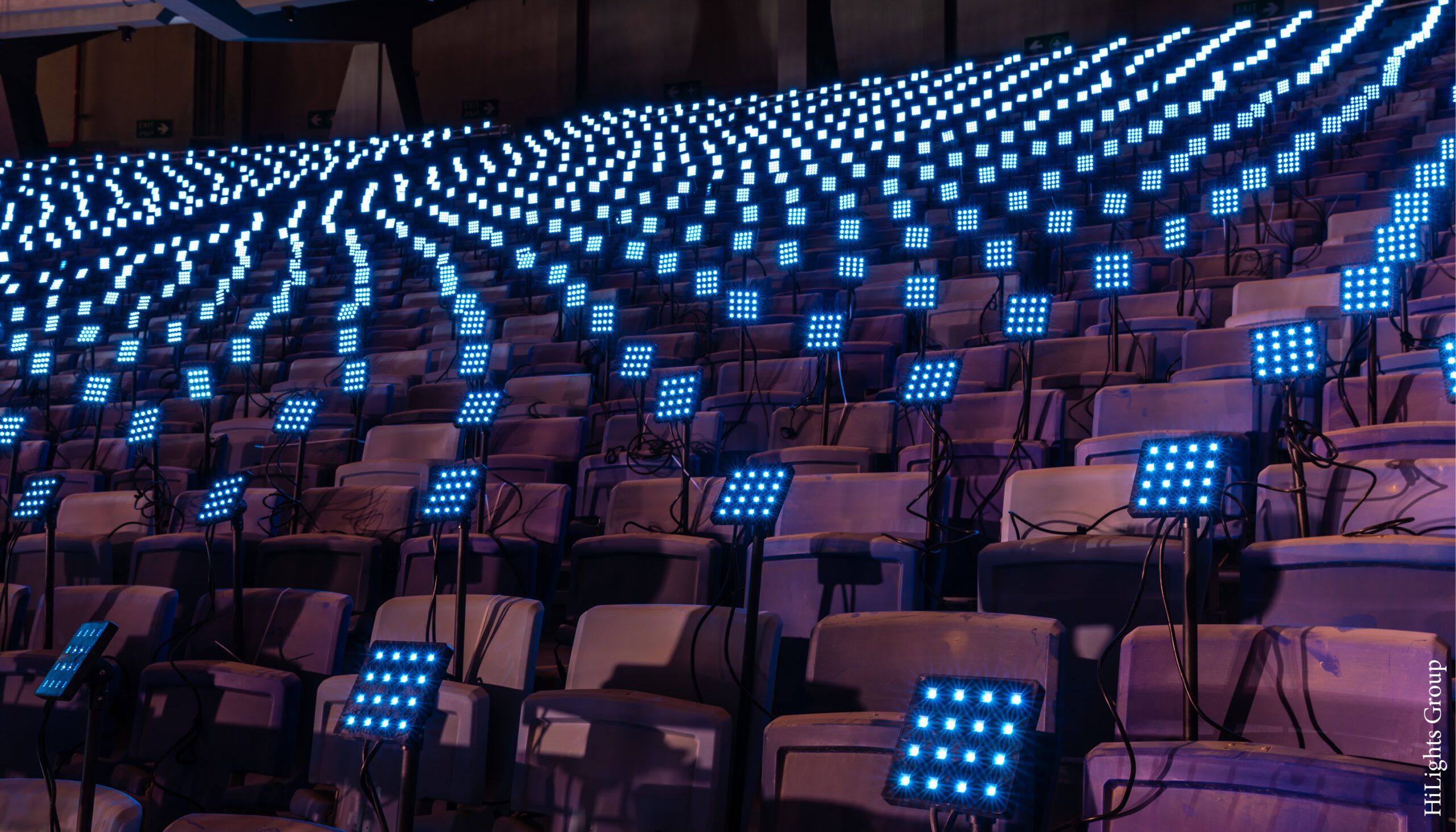 stage equipment at stadium, a blue square at each seat