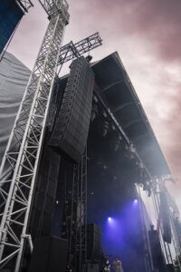line-array loudspeakers on outdoor stage
