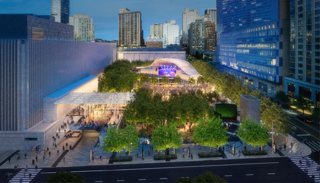 Aerial view of urban park with amphitheatre, lush trees, and performance pavilion surrounded by skyscrapers. Pathways connect public spaces between modern architectural elements.