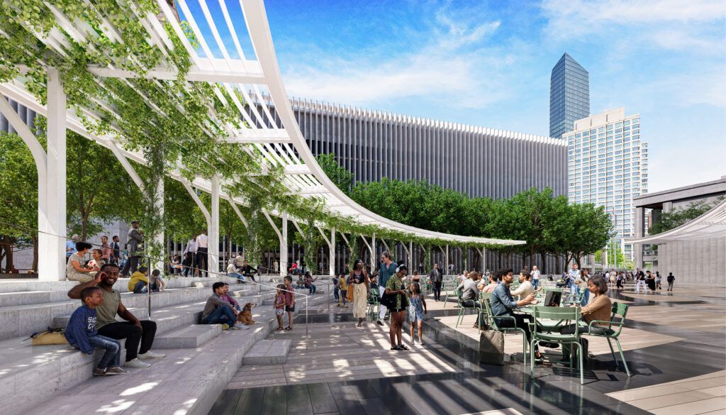 Sunny outdoor terrace with white pergola structure, stone steps, and green space. People relax at cafe tables while others walk through the urban plaza.