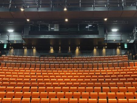 LSI delivers technical solution for Sadler’s Wells East Empty theatre auditorium with orange seats and dark balcony