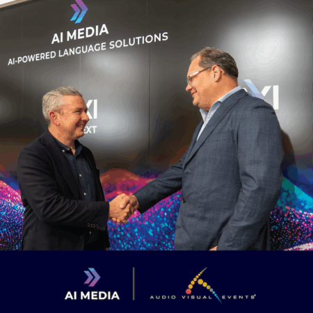 AI-Media and AVE partner for AI-powered captioning at Australian live events Two businessmen shaking hands at AI Media language solutions event