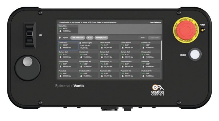 Front view of the Spikemark Vantis handheld controller, showing touchscreen display, joystick, enable button and red emergency stop button, on a black housing with Creative Conners branding