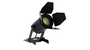 A black compact LED par fixture with open barn doors, showing a green-tinted RGBL lens — the GLP impression X5 Dot Wash — photographed against a white background.