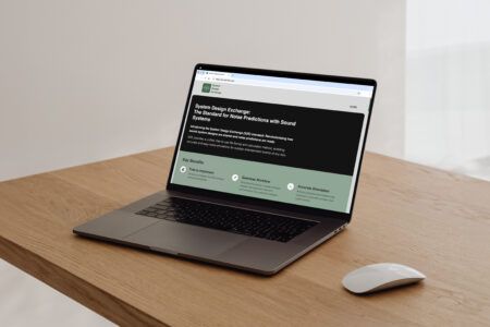 Audio trio launches unified noise prediction standard for outdoor events A laptop on a wooden desk displaying the System Design Exchange homepage, introducing the SDE standard for noise predictions with sound systems.