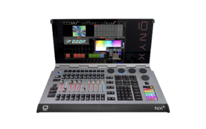 Obsidian NX3 lighting console, a portable clamshell-style surface with a large touchscreen displaying the Onyx software, ten motorised faders, RGB-backlit keys, rotary encoders and a colour-selection touchpad